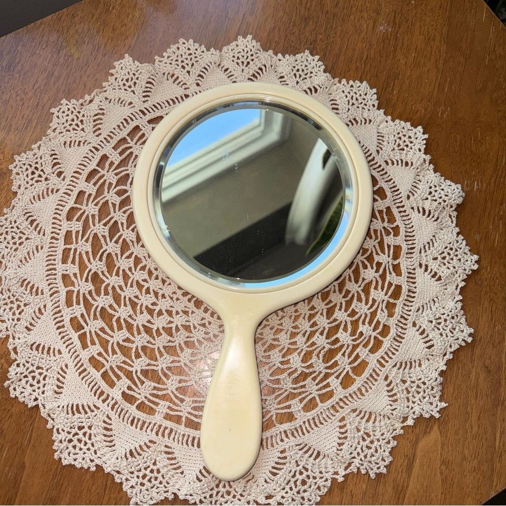 Vintage Art Deco Vanity Hand Mirror Bakelite Celluloid? Fairly heavy for mirror